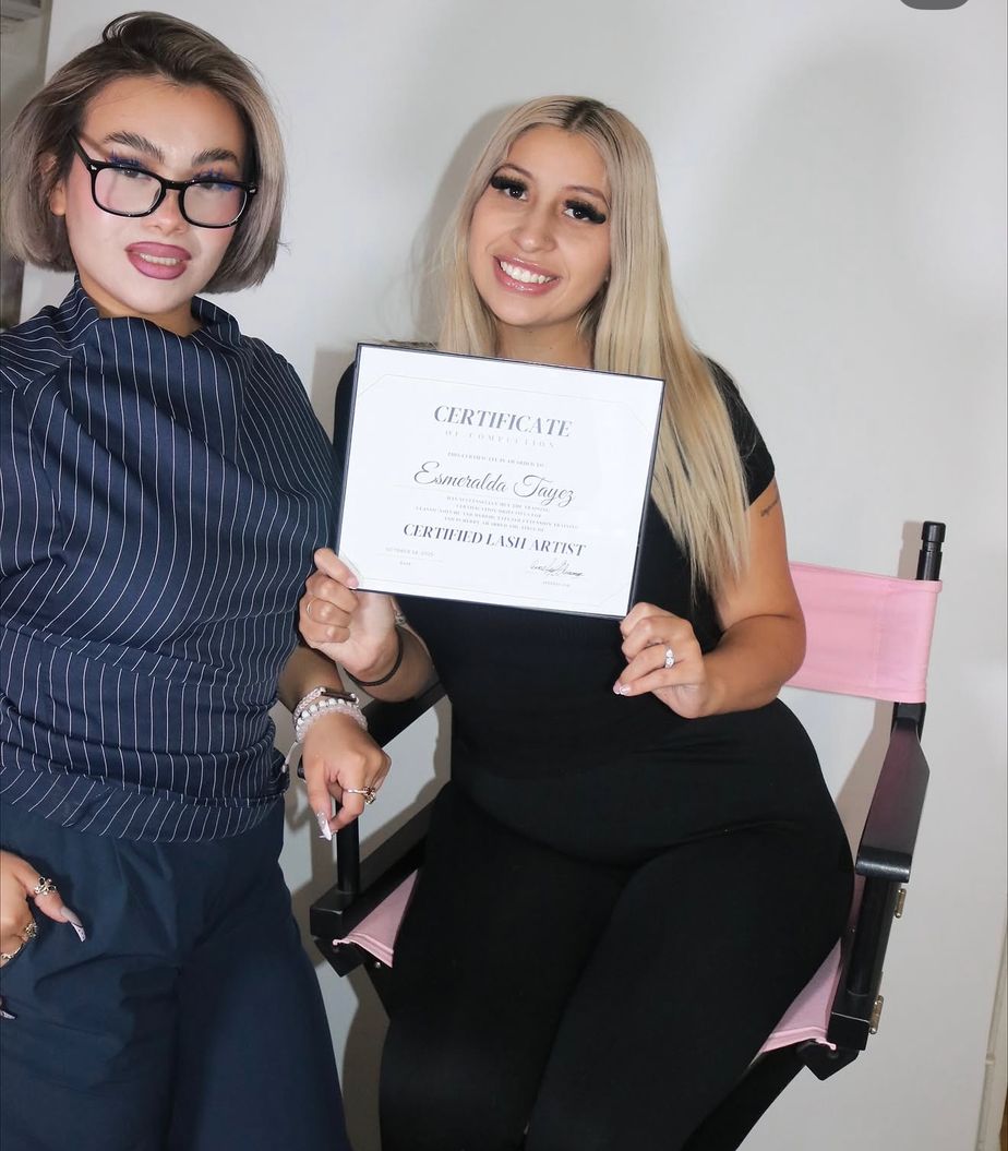 Gem with a student holding her certificate