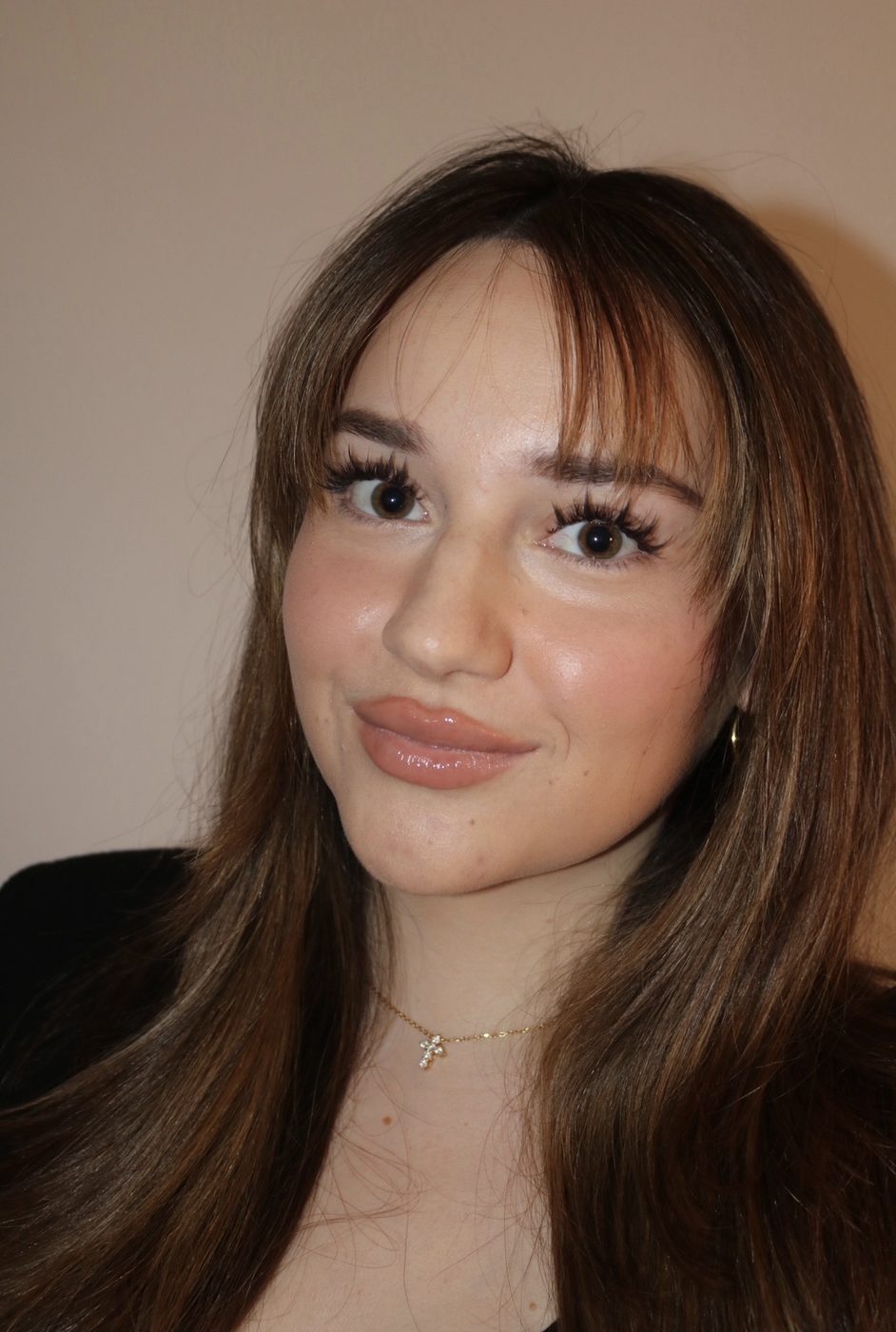 Client wearing a soft, fluffy custom lash set